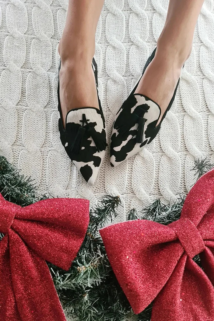 COW PRINT LOAFERS WITH TASSEL