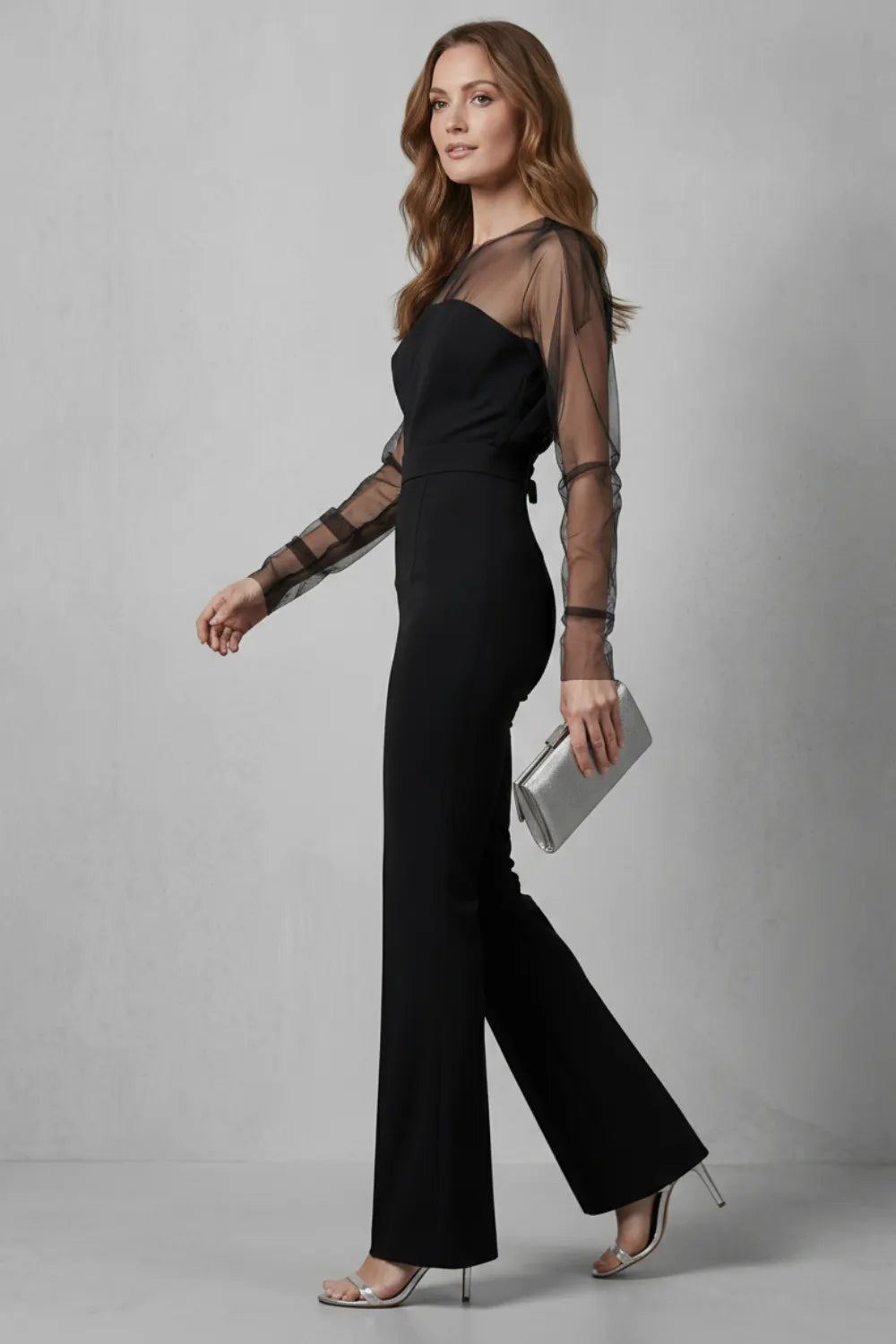 Sheer illusion elegance – Flared-leg jumpsuit
