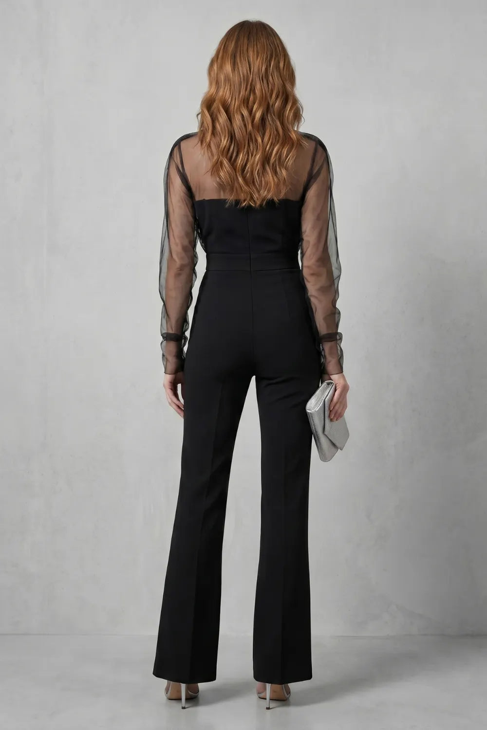 Sheer illusion elegance – Flared-leg jumpsuit