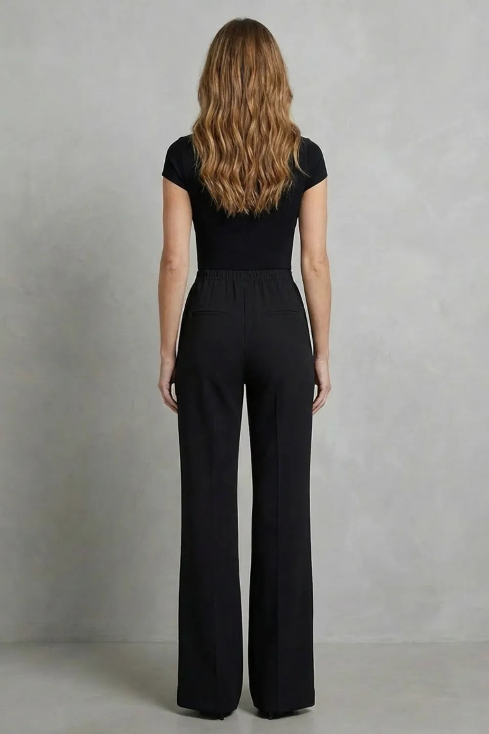 Streamlined silhouette – High-waist wide-leg trousers